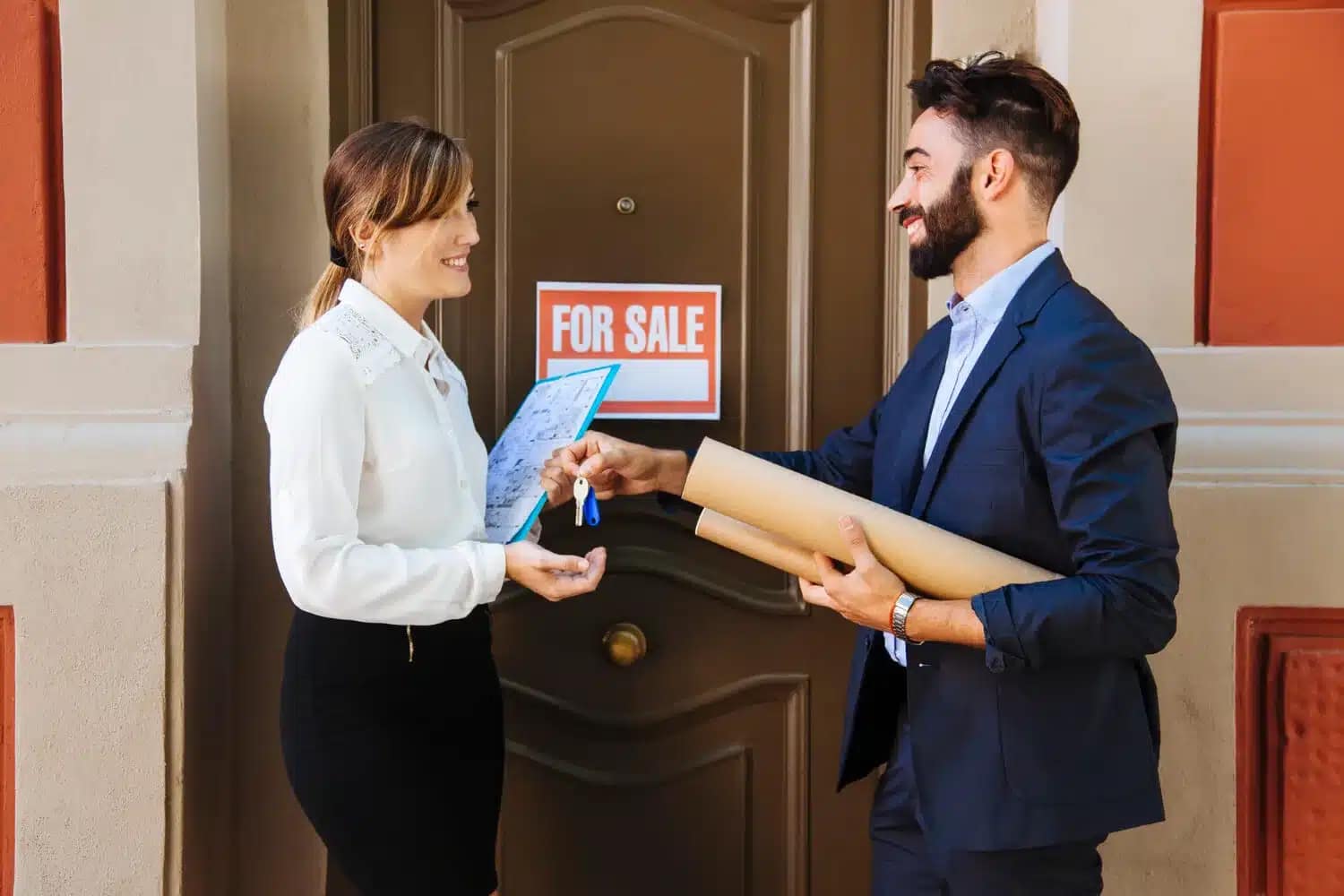 A woman with a clipboard and house plan receives a key from a man in a suit outside a door with a For Sale sign, highlighting an easy way to sell your house fast to a cash buyer.